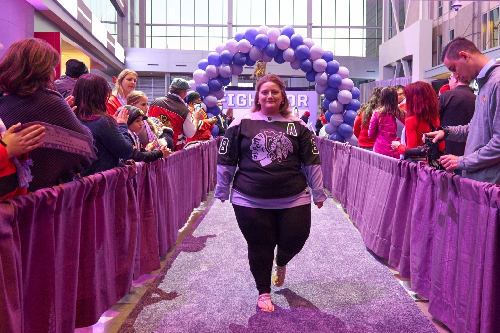 Rebecca Reynoso walks the Purple Carpet for the Chicago Blackhawks Hockey Fights Cancer night 